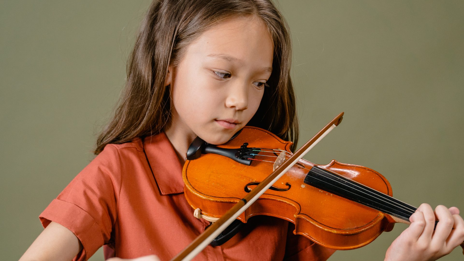 a violin and bow on a white background